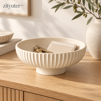 zityuter™ fluted ceramic pedestal bowl styled in a warm modern living room