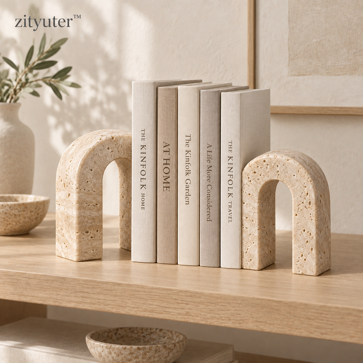 zityuter Travertine Double-Arch Bookends styled on a bookshelf